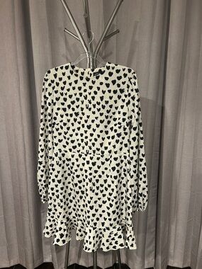 PrettyLittleThing White Dress with Black abstract looking hearts.